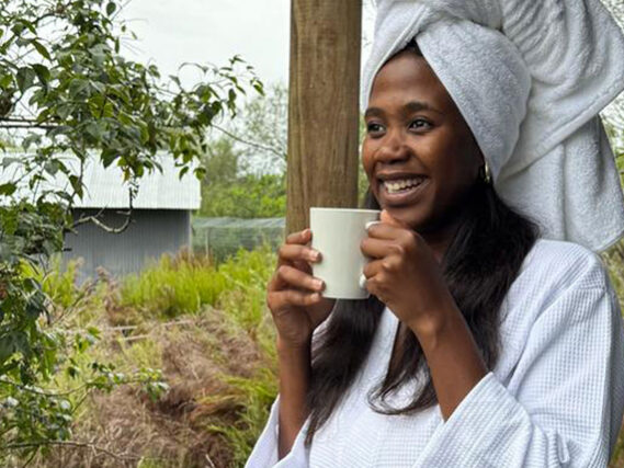 Lady-drinking-coffee Wellness Retreats in Africa